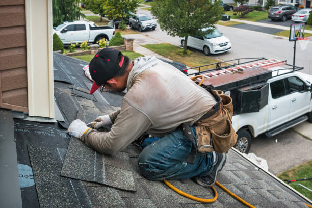 Professional Emergency Roof Repair technician working in Melrose, NY